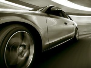 silver car in tunnel
